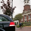 Met de ligfiets bij de Protestantse kerk in De Cocksdorp
