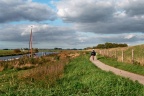 Ligfietsen bij het Reitdiep vlakbij de fietsbrug bij de Wetsingersluis